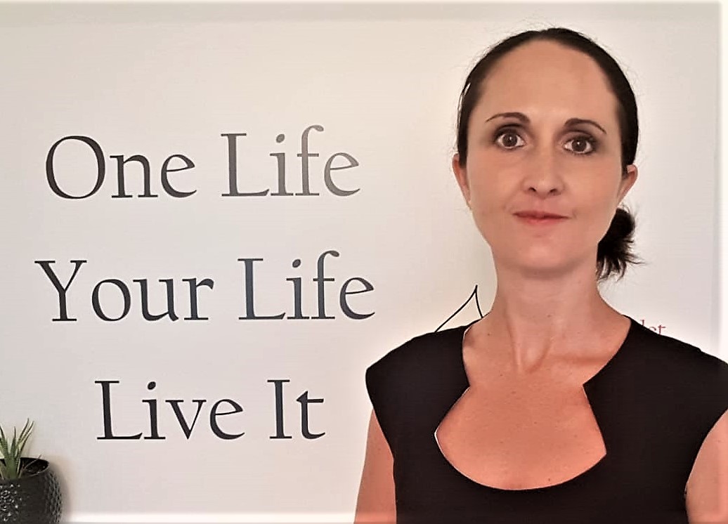 Image of Simona Hamblet with her slogan One Life Your Life Live It - Coach for Legal Professionals