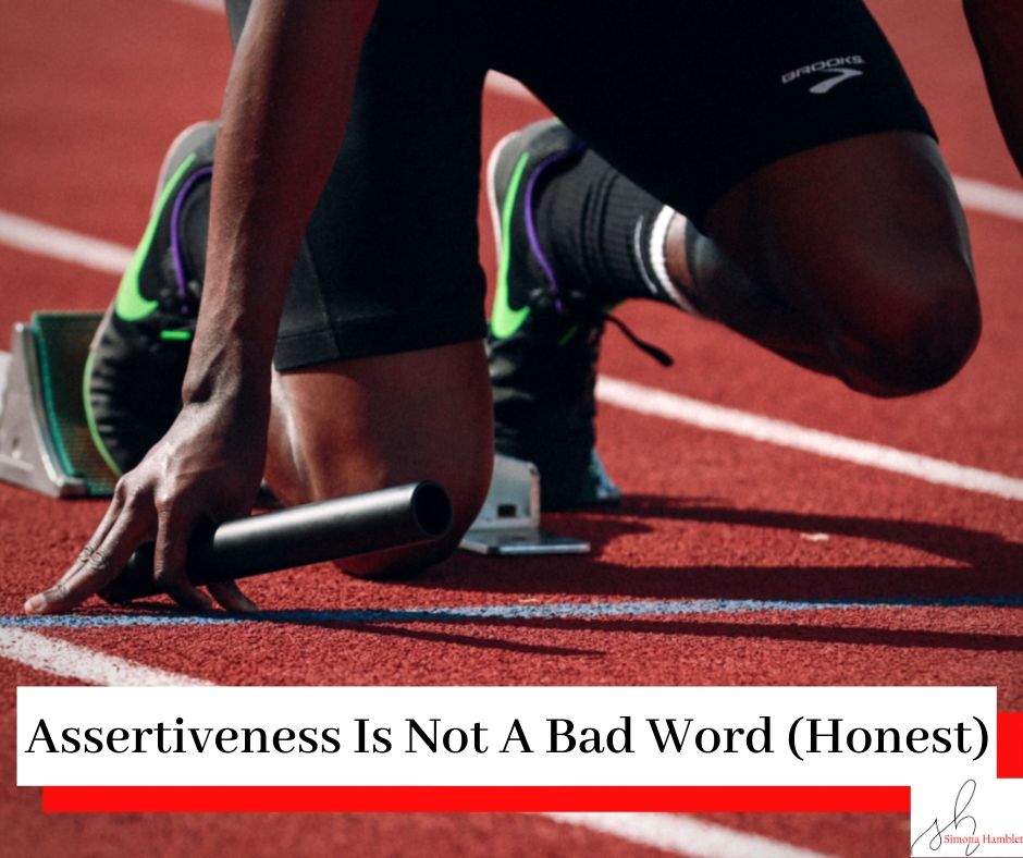 Picture of a runner on a race track with the title Assertiveness Is Not A Bad Word (Honest)