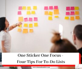 Lady facing a white board with lots of coloured stickers, others sat around a work place desk, with the article title One Sticker One Focus - Four Tips For To-Do Lists