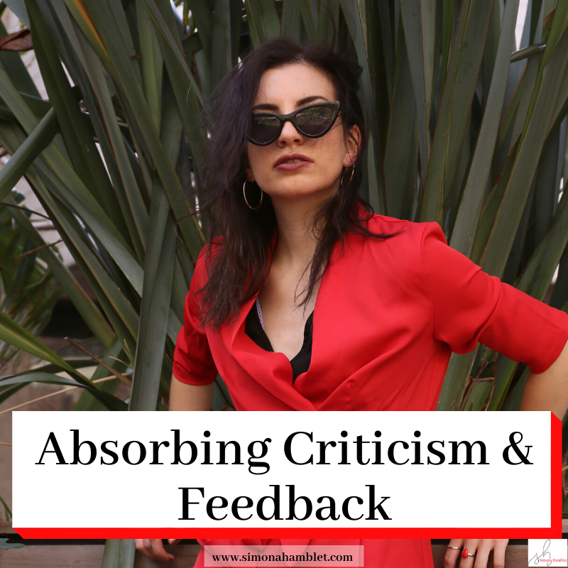 Female with title Absorbing Criticism & Feedback