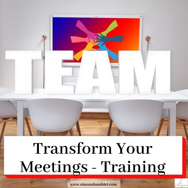 Table with TEAM written on it, and header Transform Your Meetings -Training