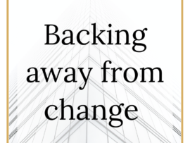 An image of a law firm building in white with the words 'backing away from change' on the front.